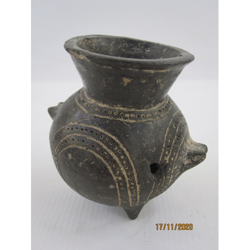 149 - Archaeological find, a small antique black pottery two handled jar with flared rim, the body with in... 