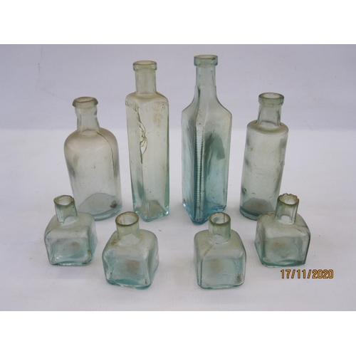 151 - Collection of eight chemist and ink glass bottles including one from Osmond & Son Ltd, Grimsby