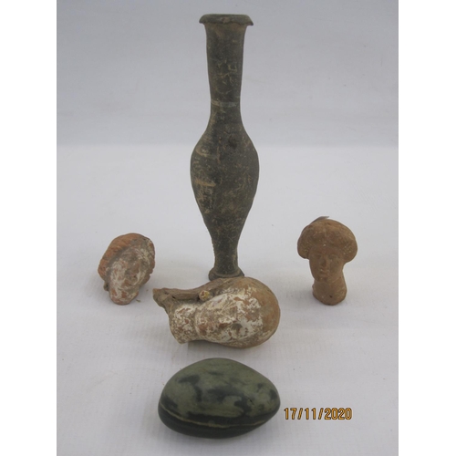 152 - Three roman terracotta female heads, two with remnants of paint, a pottery unguent bottle, 14.5cm hi... 