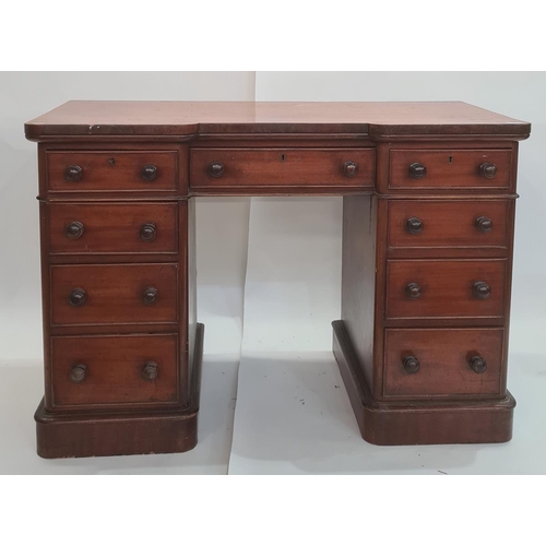 17 - Victorian mahogany kneehole pedestal desk having shaped top with three frieze drawers, an arrangemen... 