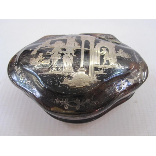 173 - 18th century tortoiseshell and silver snuff box of shaped oval form, the cover inlaid with figures a... 