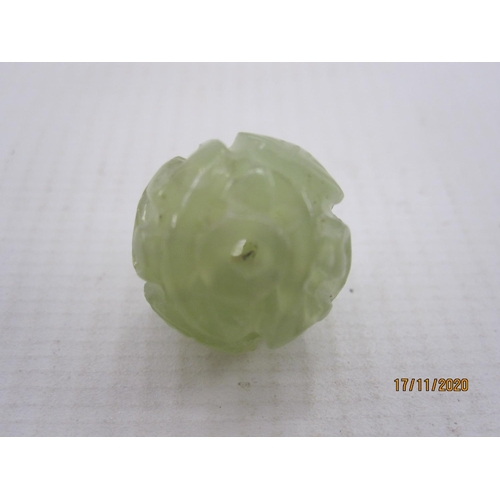 196 - Chinese carved and pierced pale celadon jade bead, 1.5cm diameter