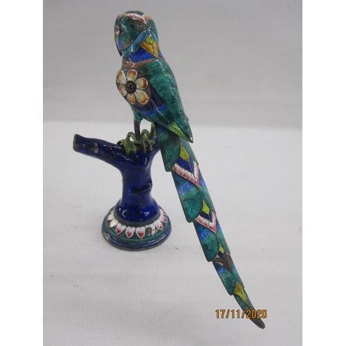 199 - Indian silver-coloured metal and enamel polychrome model of a parrot perching on a branch, the wings... 