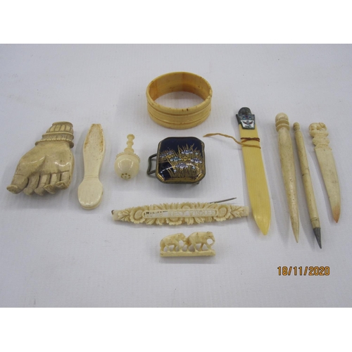 208 - Quantity of antique ivory miniatures to include back scratcher hand, miniature paper knife with enam... 