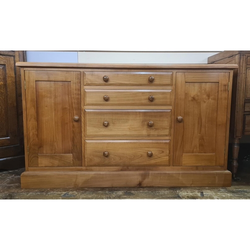 47 - Modern cabinet/chest with four short drawers flanked by pair cupboards, 130cm wide