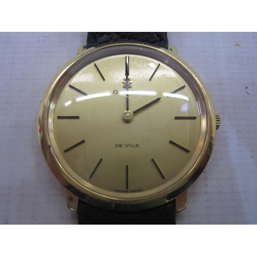 476 - Gentleman's Omega De Ville strap watch, the circular dial with baton markers in gilt metal case with... 