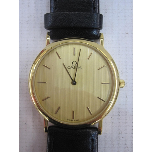 485 - Gentleman's Omega De Ville strap watch, the circular dial with baton markers in gilt metal case and ... 