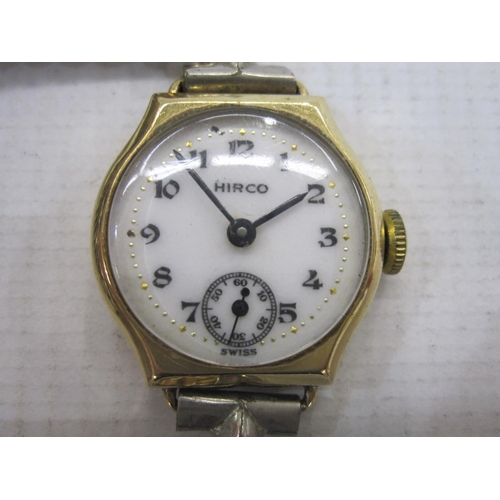 496 - Lady's 9ct gold Hirco bracelet watch, the circular dial with subsidiary seconds dial and on expandin... 