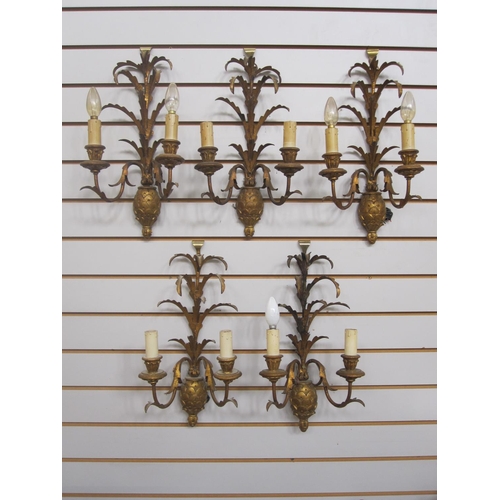 51 - Set of five twin-branch wall lights in the form of pineapples, with carved wood pineapple body and g... 