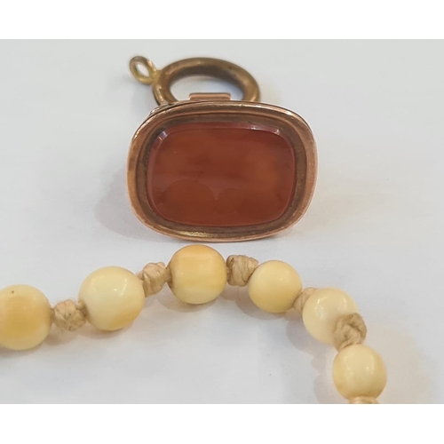 539 - 19th century gold coloured seal fob set with blank cornelian tablet, a Sheaffer's rolled gold propel... 