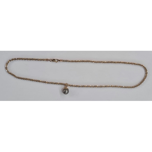 594 - 9ct two coloured gold fancy ornate twisted link chain and a  faux pearl pendant, the chain is 9.6g a... 