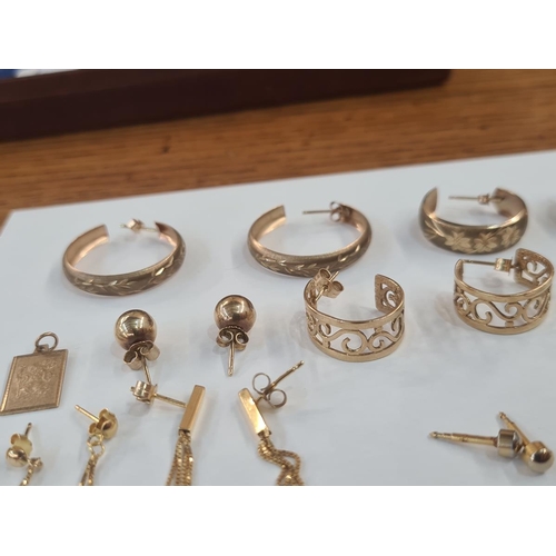 601 - Quantity of 9ct gold and other hoop drop and pendant earrings and a 9ct gold St Christopher pendant,... 