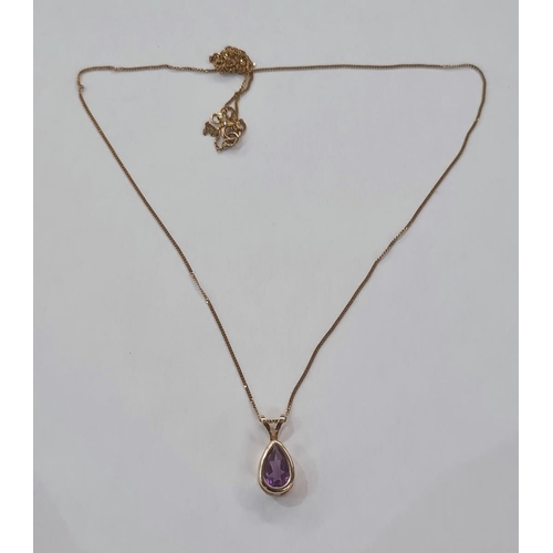 628 - 10K gold and amethyst-coloured stone pendant, teardrop-shaped, on fine chain