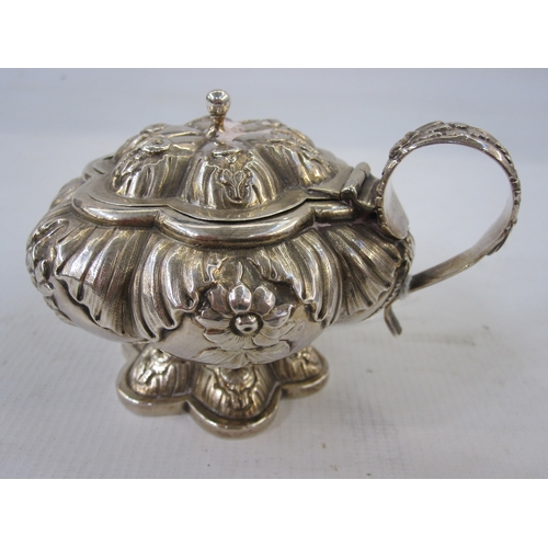 267 - A George IV silver lidded mustard pot, floral repousse decoration, on sexafoil base, London 1828, ma... 