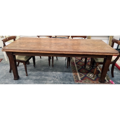 9 - Late 19th/early 20th century oak dining table, the rectangular top with canted corners, moulded edge... 