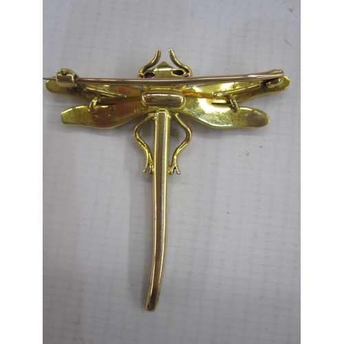 548 - Gold brooch modelled as a dragonfly with enamel body, split pearl wings and ruby eyes, marked 14ct a... 