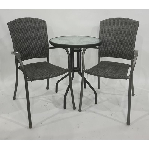 1025 - Circular glass topped garden table and two chairs (3)