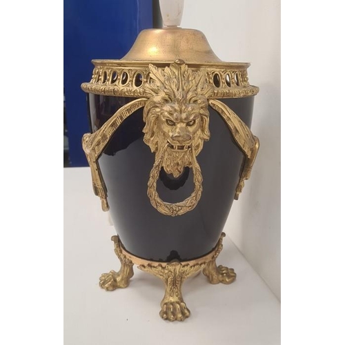 12 - Gilt metal mounted royal blue china table lamp with pierced arched border, pair lion mask and wreath... 