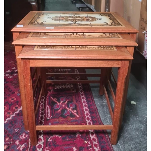 1210 - Mid 20th century nest of three tile-top coffee tables