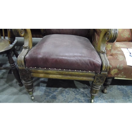 1242 - Late 19th century William IV style oak-framed library armchair with leather upholstered scrolling ar... 