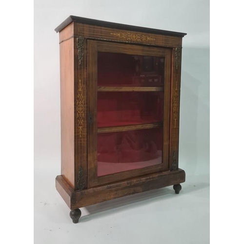 1281 - 19th century walnut bookcase, the single glazed door enclosing shelves, on plinth base, turned feet,... 