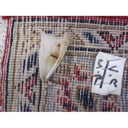 1322 - Persian Kashan carpet, the red ground field with stepped central medallion, the field decorated all ... 