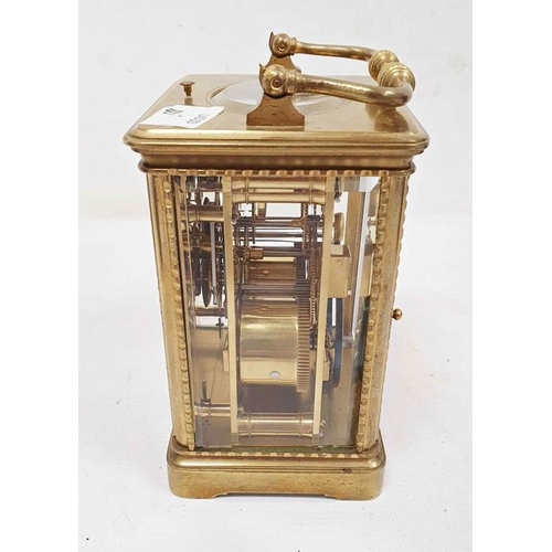 1334 - Brass and glass carriage clock with Roman numerals to the dial, in carry case