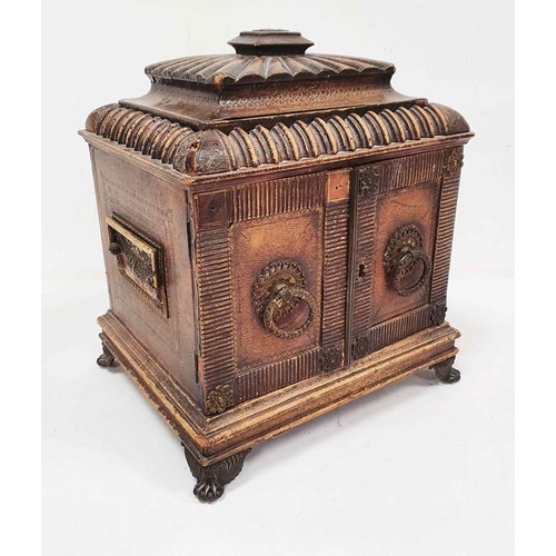 1350 - Unusual box covered in leather, the lid of pagoda form above two doors enclosing shelves as the spin... 