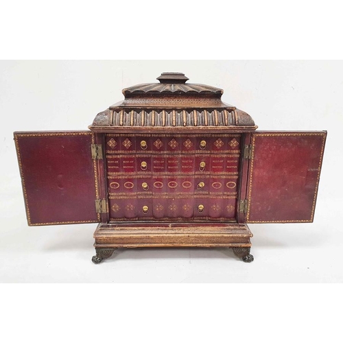 1350 - Unusual box covered in leather, the lid of pagoda form above two doors enclosing shelves as the spin... 