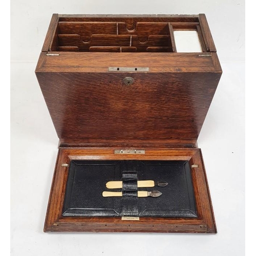 1352 - Early 20th century oak stationery box opening to reveal compartments for letters, stationery, etc