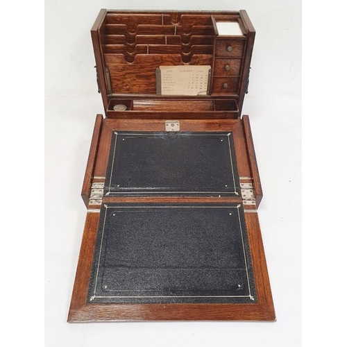 1352 - Early 20th century oak stationery box opening to reveal compartments for letters, stationery, etc