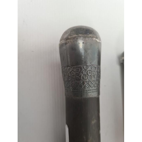 189 - Early 20th century walking cane with silver top, bearing the regimental crest for Hampshire, another... 