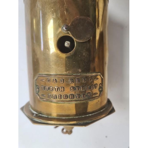 202 - Brass meat jack with label for C&J Reed, North Street, Brighton, brass kitchen utensils and a large ... 