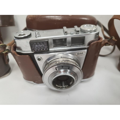 230 - Pentax ME Super camera with 1:1.750mm lens, a Kodak Retinette camera, another Kodak camera, a pair o... 