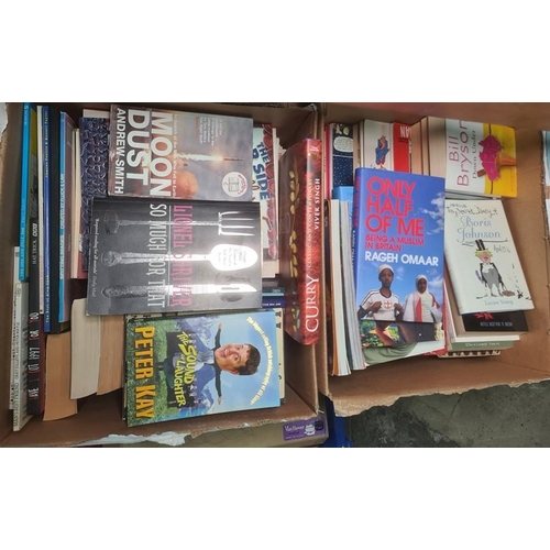 235 - Four boxes of assorted books including fiction, Matt cartoon annuals, recipe books, etc. (4)