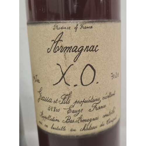 249 - One bottle Chateau du Cariquet Armagnac XO and another bottle, the capsule marked Cognac, E Normandi... 