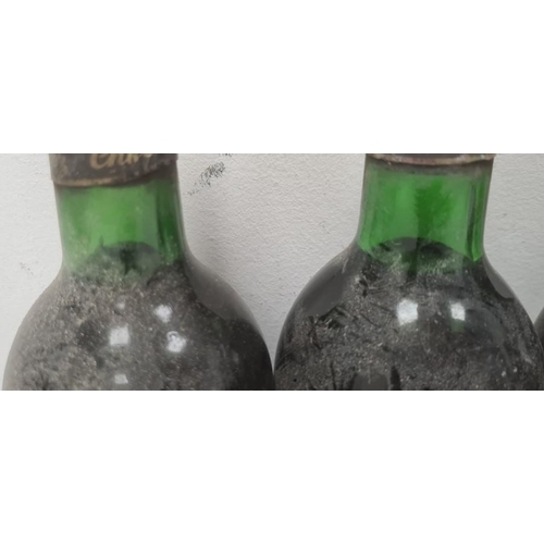 259 - Four bottles of Chateau de Pez St. Estephe to include two bottles 1975, one of 1979 and the other un... 