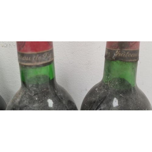 259 - Four bottles of Chateau de Pez St. Estephe to include two bottles 1975, one of 1979 and the other un... 