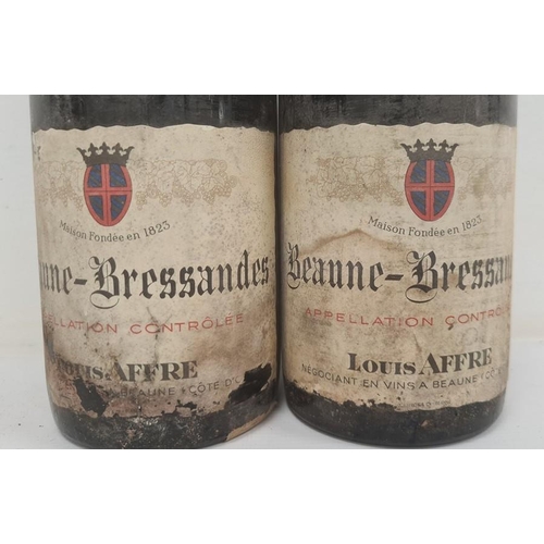 275 - Two bottles of 1964 Beaune Bressandes (labels torn) (2)  (Provenance - this lot has been stored in a... 