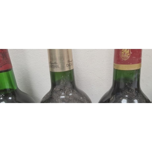 278 - Two bottles of 1979 Chateau les Templiers Lalande de Pomerol, a bottle of 1974 Chateau Montrose L Ch... 