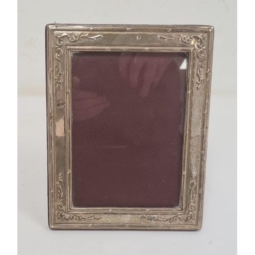 300 - Late 20th century rectangular silver-mounted picture frame, frame with repousse decoration, Birmingh... 