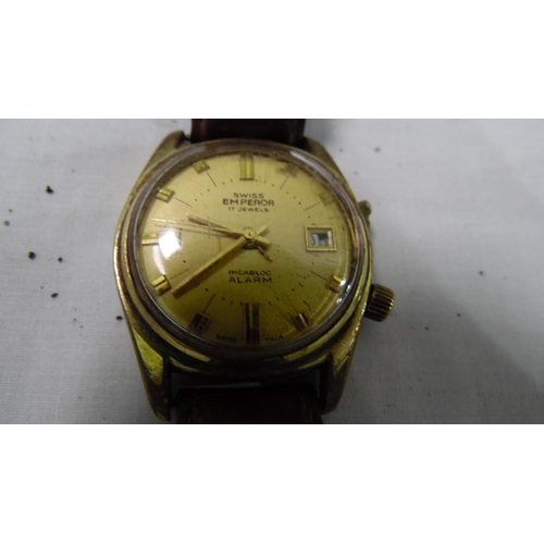 318 - Swiss Emperor 17-Jewels Incabloc alarm watch with baton numerals to the gold coloured dial, collecti... 