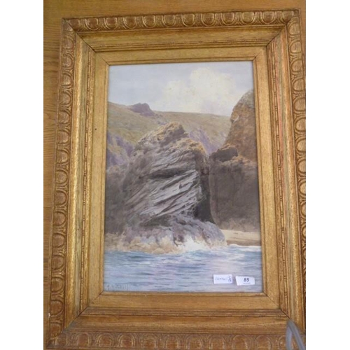 428 - A Mitchell (20th century school)
 Watercolour 
 Coastal scene with cliff edge and rocks, signed lowe... 