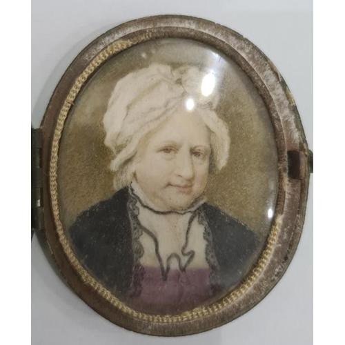 493 - 19th century school 
 Watercolour miniature on ivory 
 Head and shoulders portrait of a lady in whit... 