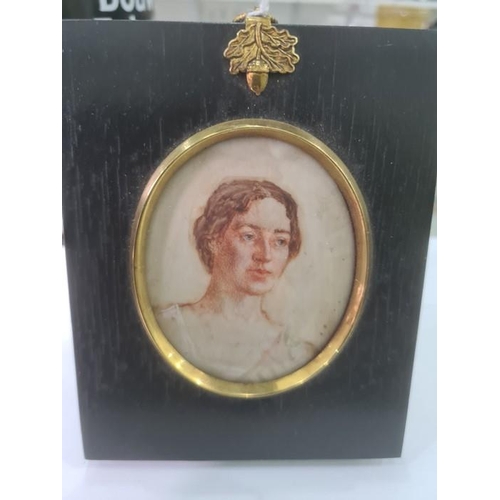 494 - Early 20th century 
 Watercolour miniature on ivory
 Head and shoulders portrait of a young lady in ... 