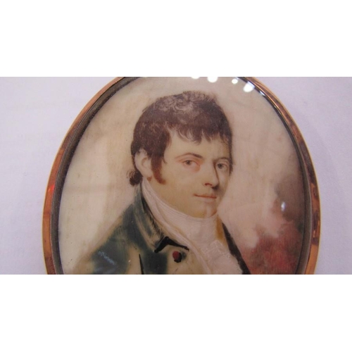 498 - Early 19th century miniature on ivory, head and shoulders portrait of gentleman, 7 cms x 5.5 cms app... 