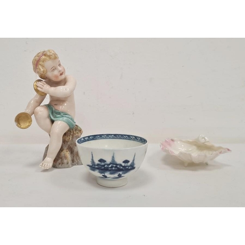 54 - Royal Worcester figure of putto type figure seated on rock with pair cymbals, small porcelain shell ... 