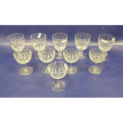 92 - Large cut glass pedestal bowl with raised lozenge decoration, quantity various cut stemmed wines, cu... 