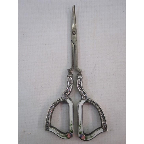 140 - Pair of German silver and enamel scissors, marked 'Batpre Germany', 'Sterling', white enamel decorat... 