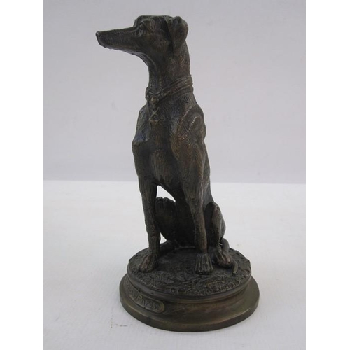 142 - Bronzed figure of a seated greyhound, on circular base, marked F Souchal Paris to base, 17cm high